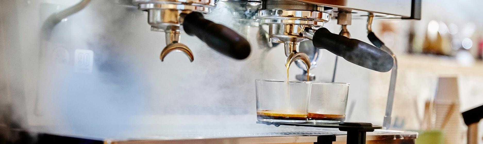 Coffee being poured machine