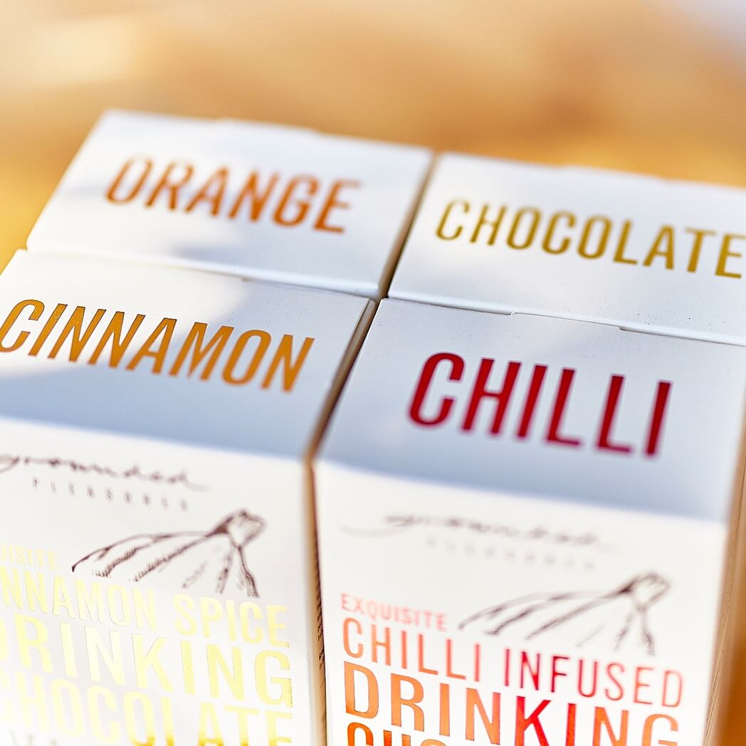 A group of grounded pleasures drinking chocolate boxes.