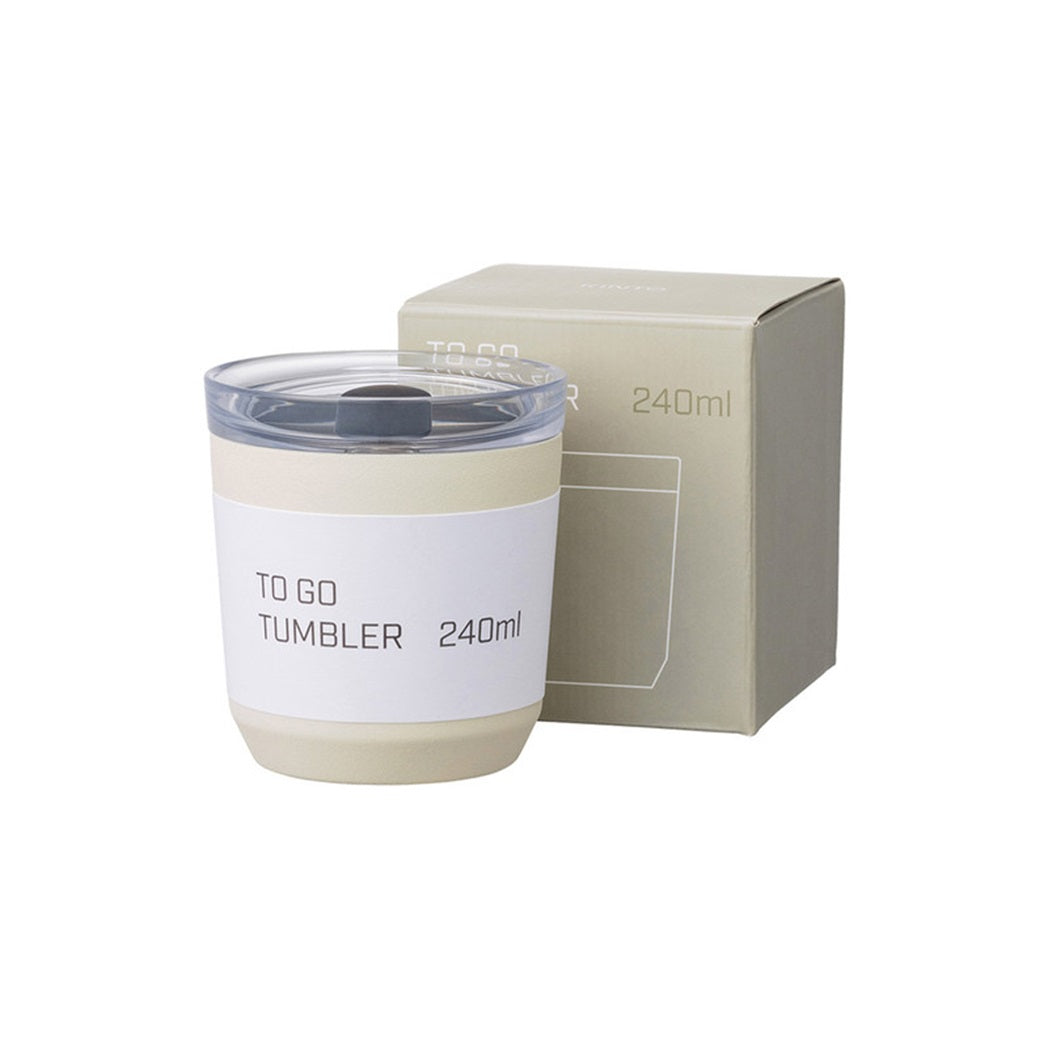 Kinto to go tumbler next to box