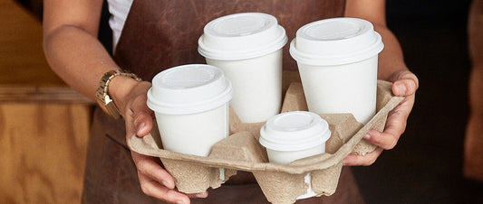Single use coffee cups in tray